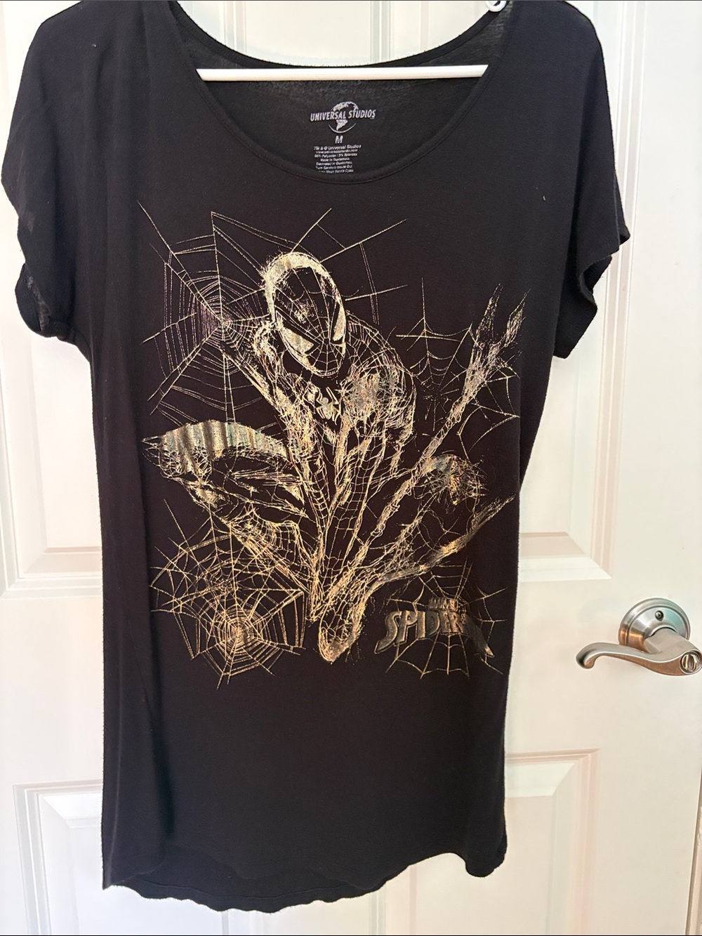 Universal Black Tee with Metallic Gold Spider-Man Web Graphic